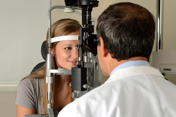 Eye Doctor with female patient