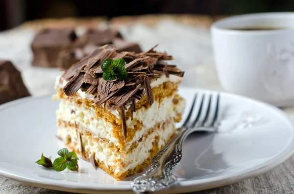 Sponge cake with cream and chocolate