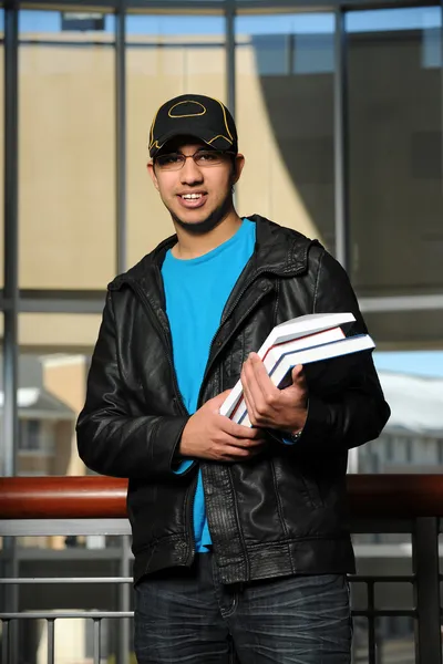 Indian Student Holding Books