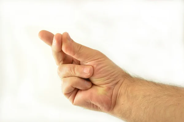 The crackling of the thumb and index finger