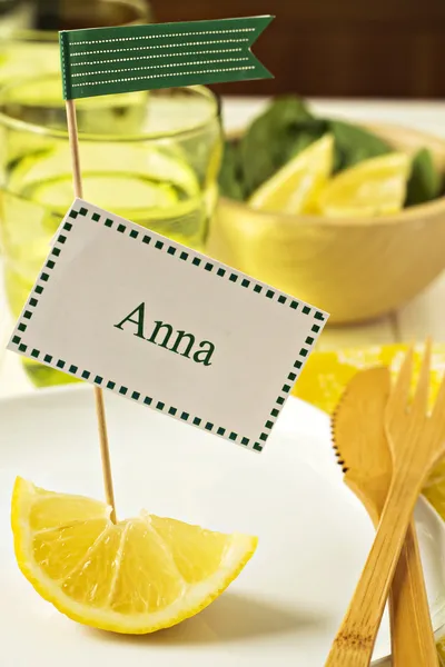 Bright and sunny table setting with a name tag