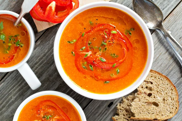 Roasted red pepper soup in white bowl