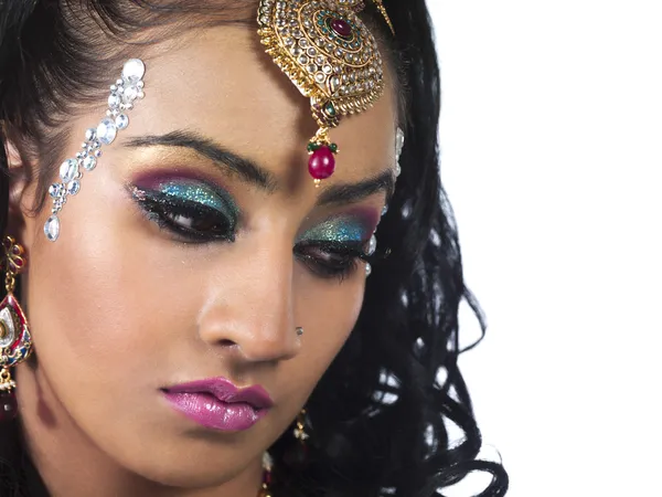 Close up image of a attractive female wearing make up and weddin