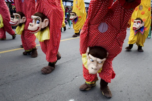 Cropped view of wearing red monkey costume at the toronto