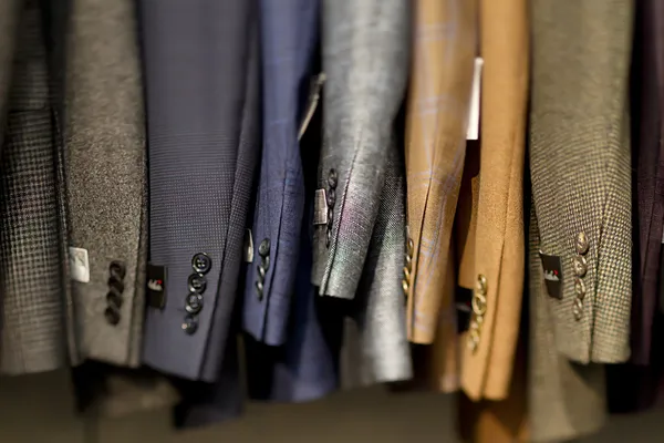 Suits hanging in store