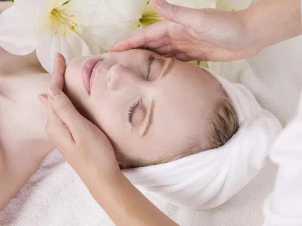 Woman having facial massage