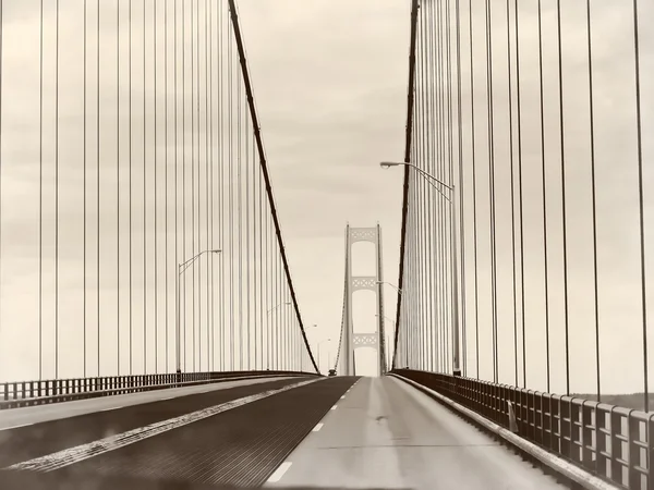 Landscape in sepia of the Mackinac Bridge, built between 1954 and 1957, the longest suspension bridge between cable anchors in the World, Michigan\'s Upper and Lower Peninsulas, USA