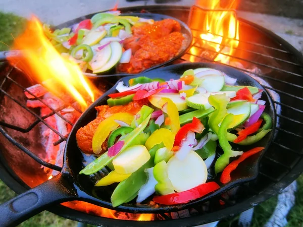 Sizzling healthy fajita chicken beef pork and veggie dinner barbecue grill cookout on a plate