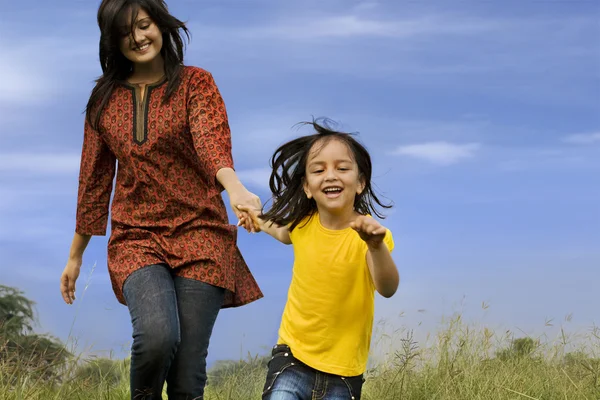 Mother and daughter in a park