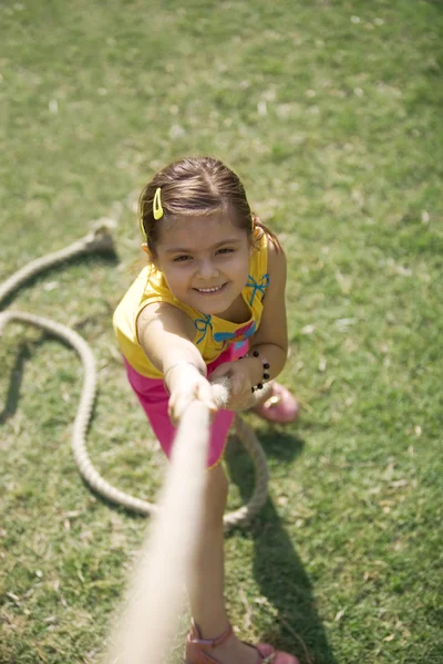 Girl pulling a rope