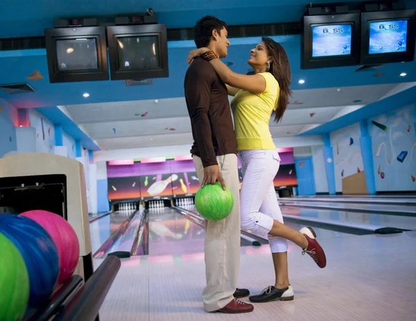 Couple at the bowling alley