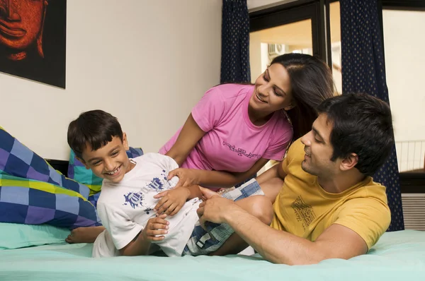 Family in bedroom