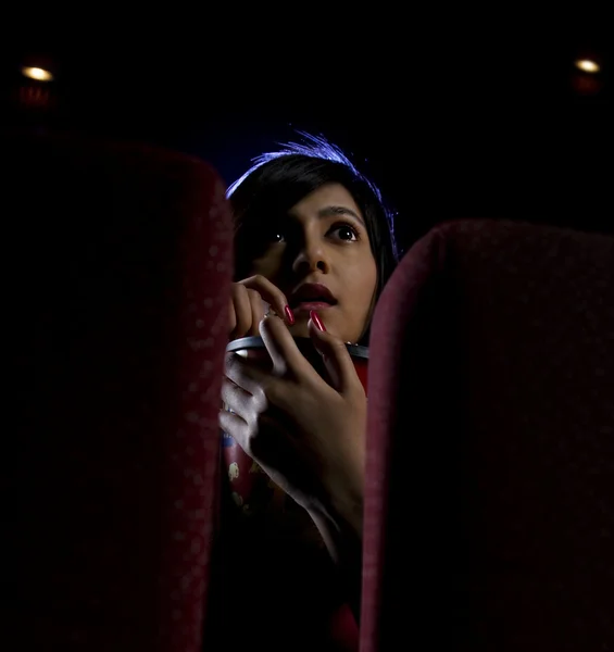 Girl watching a movie