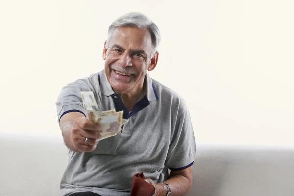 Old man with money