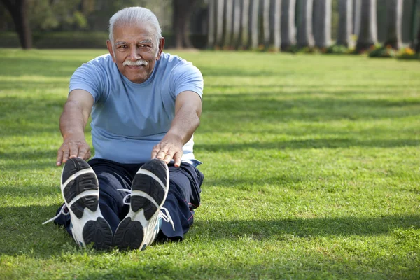 Old man doing exercises