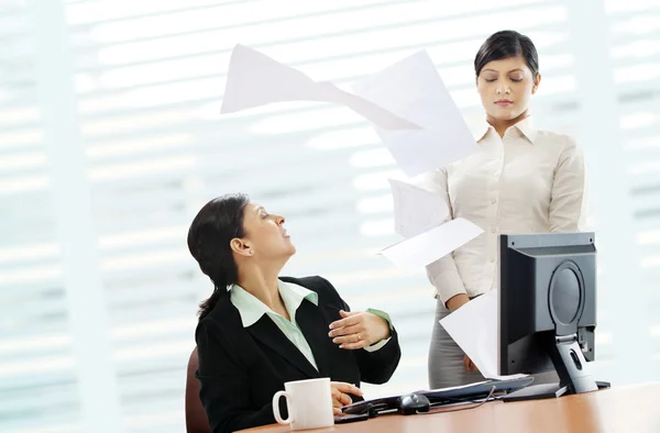 Irritated businesswoman and female executive