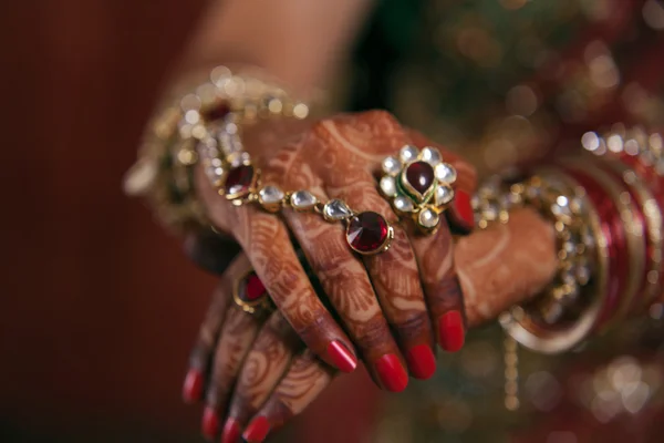 Bridal hands with henna tattoo