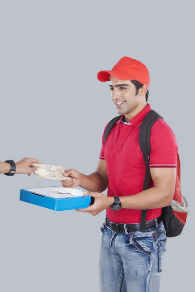Smiling pizza delivery man