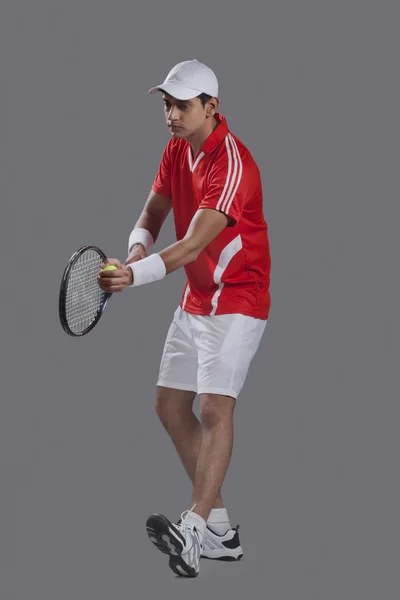 Young man tennis player