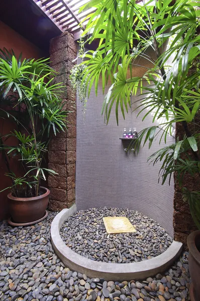 Shower room with stone on the floor