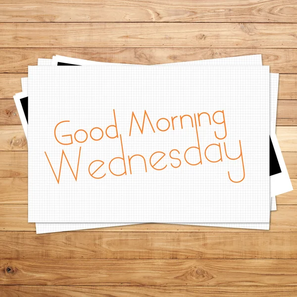 Good Morning Wednesday on paper and Brown wood plank background