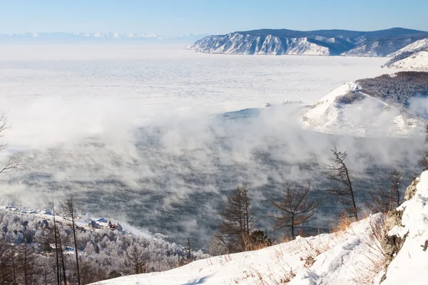 Winter landscape of Lake Baikal. Start of the Angara river