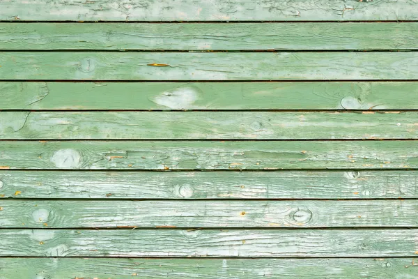 Old green painted wood wall - texture or background