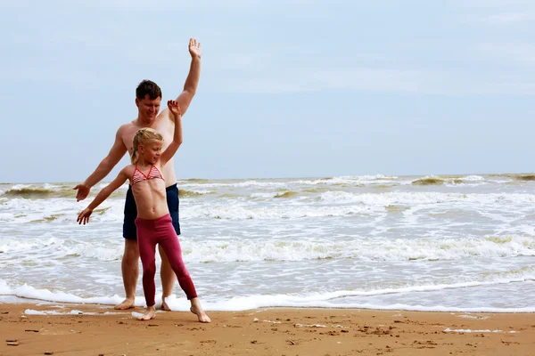 Dad and daughter involved in sports