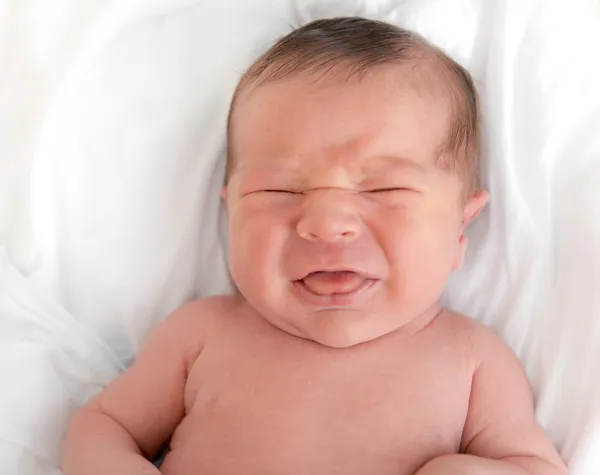 New Born Baby Expressing Anger