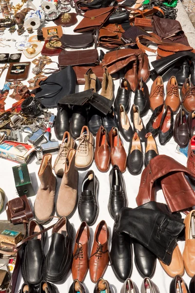 Shoes and bags on a flea market