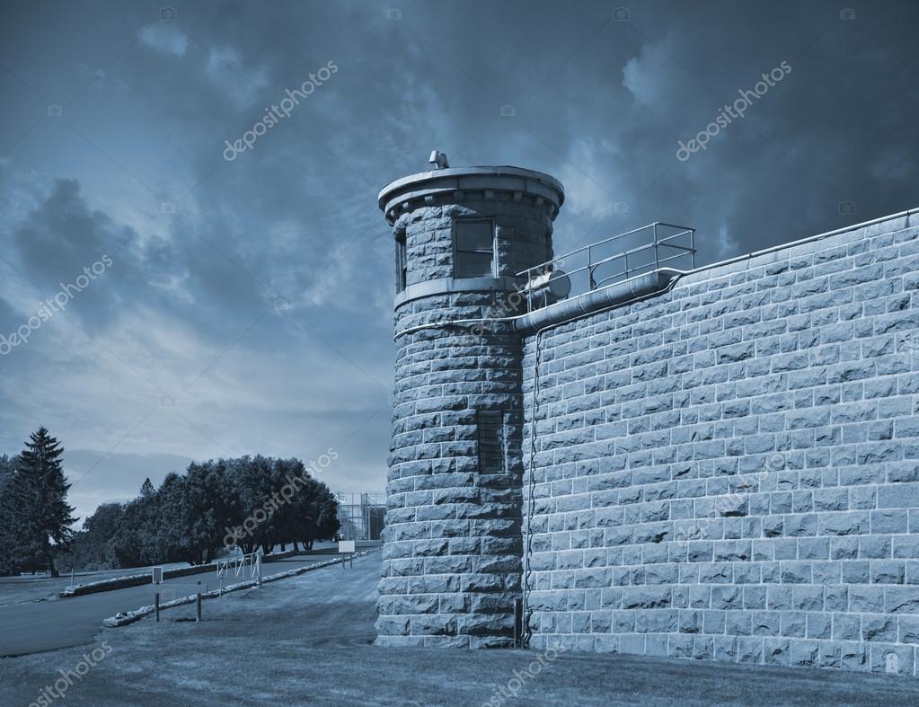 depositphotos_48901871-Guard-tower-at-corner-of-high-prison-wall.jpg