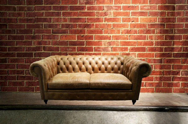 Leather sofa in brick wall room