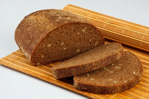 Rye bread on a straw mat