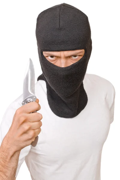 Man in black mask with knife isolated on white