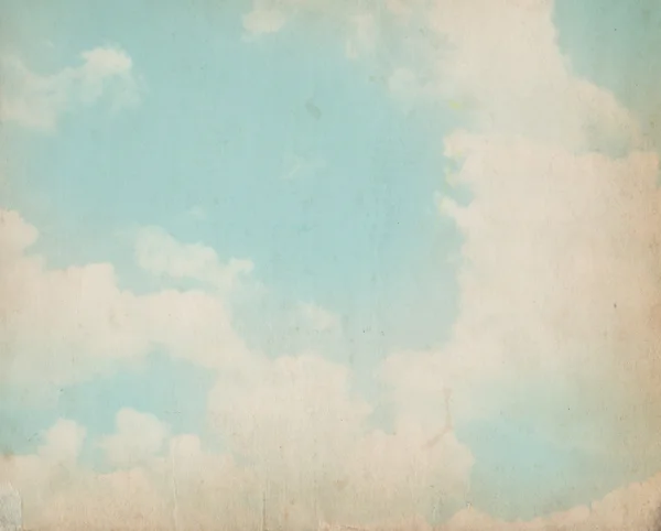Water color clouds on old paper texture background