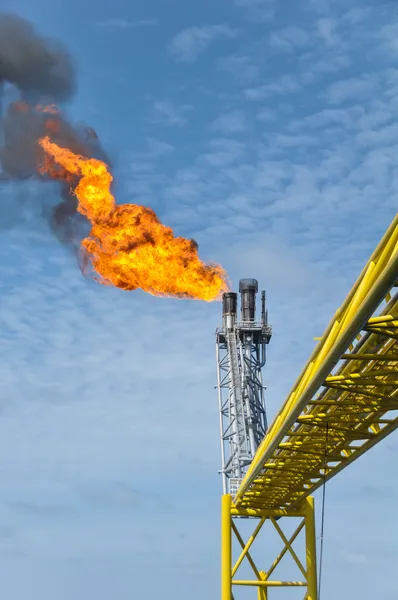 Burned flare, Oil and gas burning at flare station in oil and gas industry
