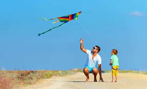 Cute kid playing with kite