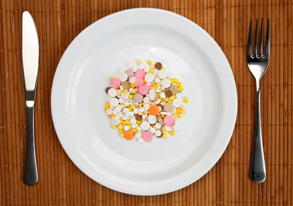Plate with pills