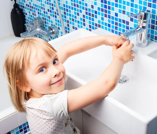 Child washing hands