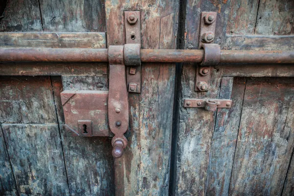 Rusty lock of old gates.