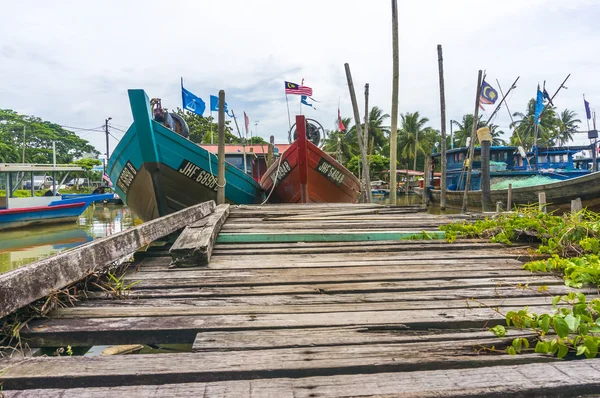 Traditional wooden boat park at deck
