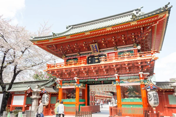 TOKYO, JAPAN - APRIL 4 2014: Visitors at Kanda Myojin Shrine. Kanda Myojin Shrine has held a special presence in Edo-Tokyo for nearly 1,300 years since its founding in 730 AD.