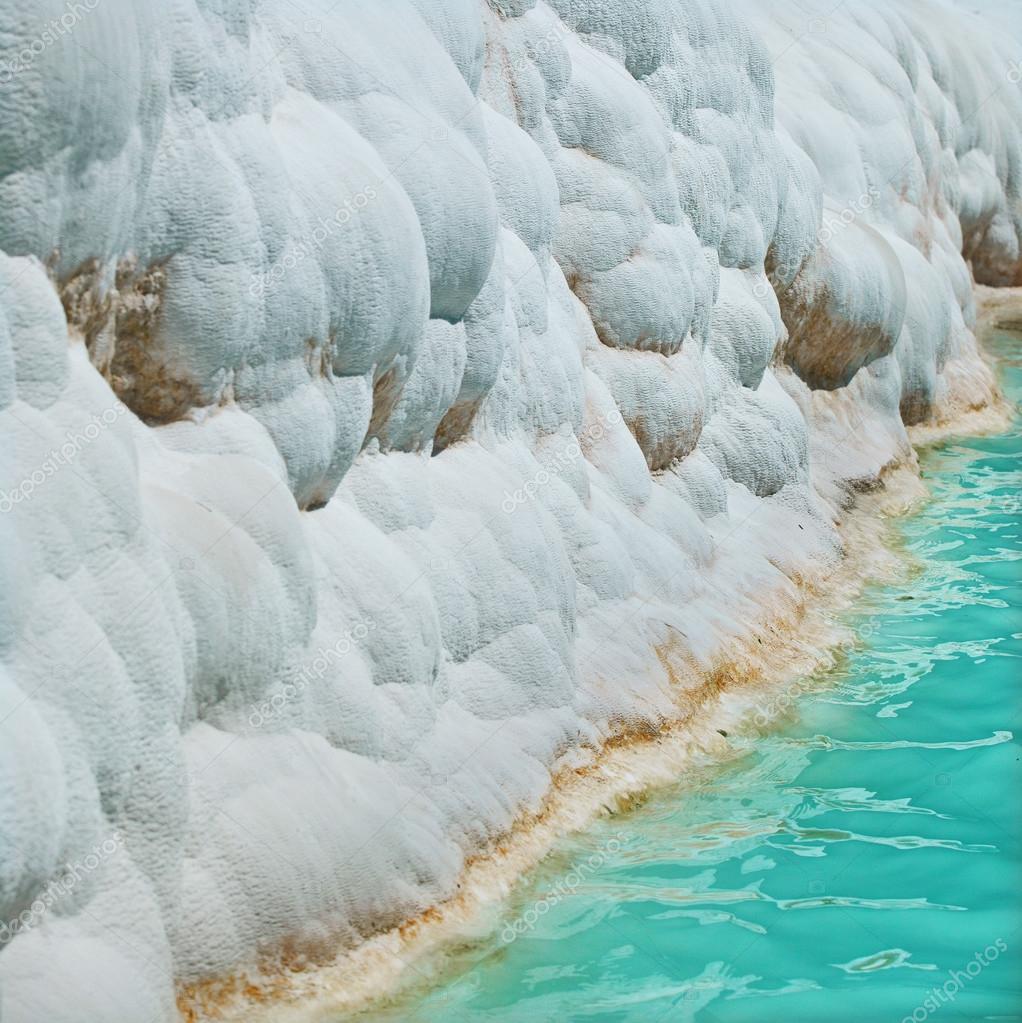 Carbonate travertines with blue water unique nature wonder in