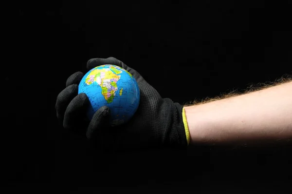 Planet Earth and a Hand