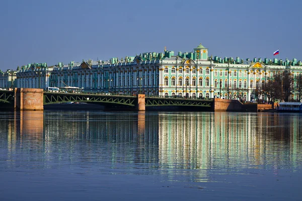 View Winter Palace in Saint Petersburg with reflection from Neva river. Russia