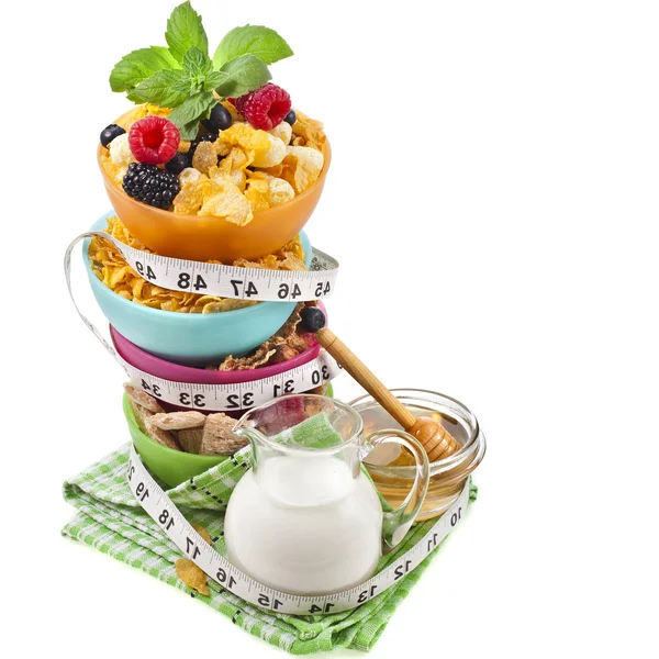Diet weight loss breakfast concept with tape measure, tower stack isolated on a white background