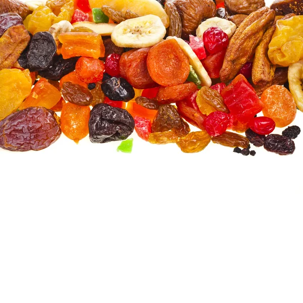 Border of mix dried fruits on white background