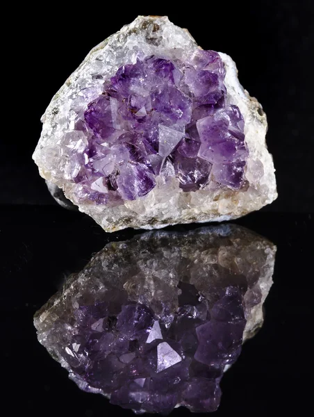 Natural cluster of Amethyst, violet variety of quartz close up macro