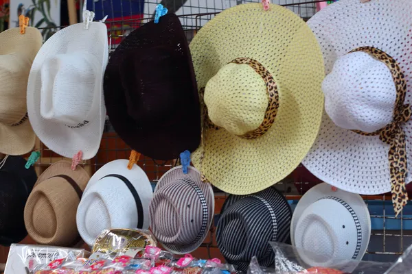 Hats for sale at Damnoen Saduak Floating Market - Thailand.