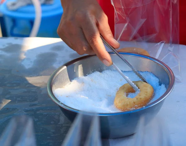 Making donut fried add sugar